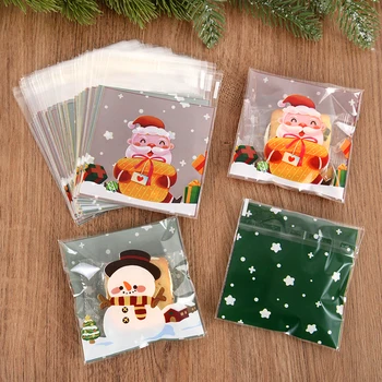  100PCS Дядо Коледа снежен човек бонбони & бисквитка пластмасови торбички самозалепваща чанта за бисквити Снек печене опаковъчни консумативи Навидад Нова година